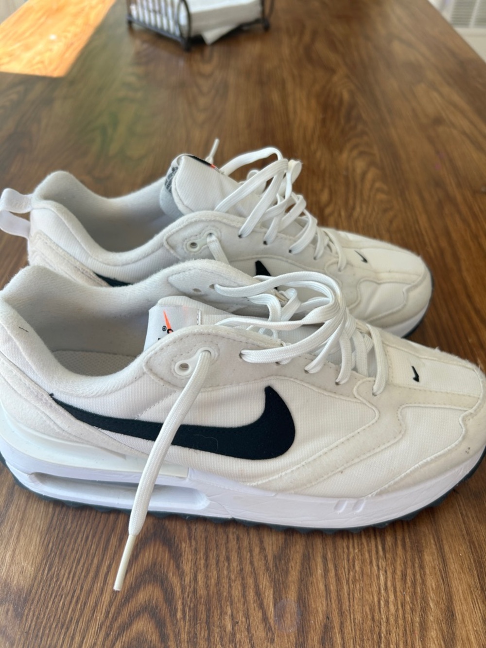 Nike White air max dawn with orange swoosh